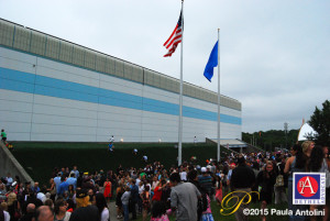 BA7_0522aftergraduationcrowd1flags