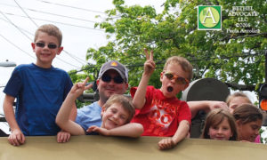 BA89_0213childrenonroofofvehicle