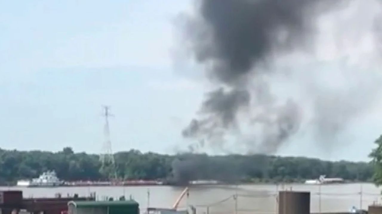 2 Killed After Helicopter Strikes Power Lines and Crashes onto Barge on Mississippi River