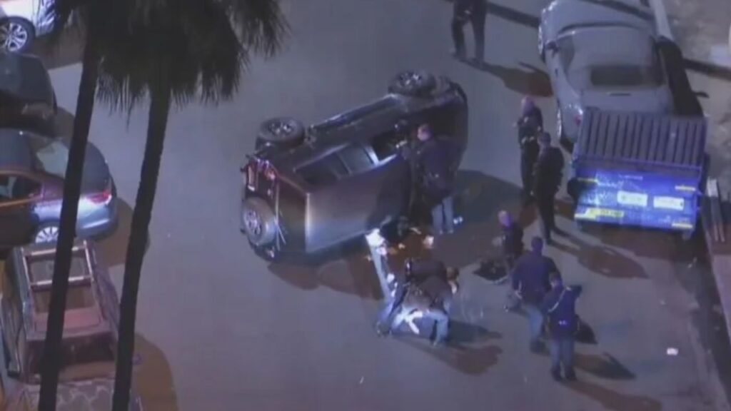 SUV Flip on Calvert Street Ends Intense LAPD Chase in Van Nuys; Suspect Partially Ejected (1)