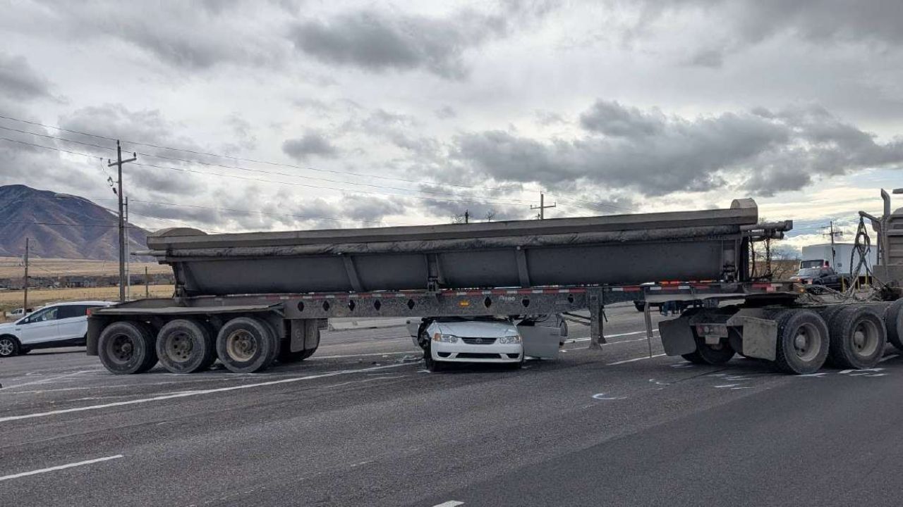 Car Becomes Wedged Under Semitruck in Lake Point; Two Injured and Rushed to Hospital