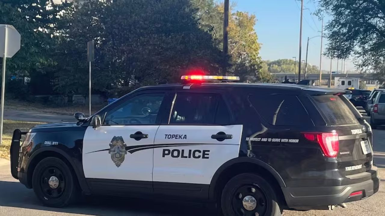 Two Arrested after Real-Time Surveillance Leads Deputies to Stolen SUV in Topeka; K-9 Finds Driver Hiding in Trash Cans