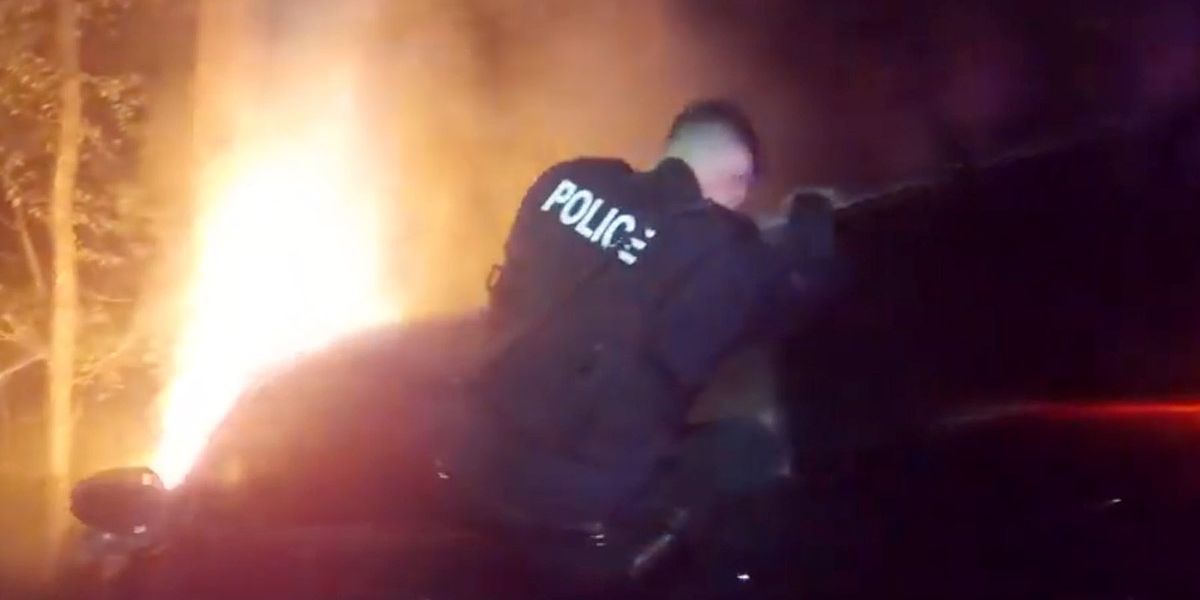 Sterling Heights Officers Rescue 80-Year-Old Woman From Burning Vehicle After Crash